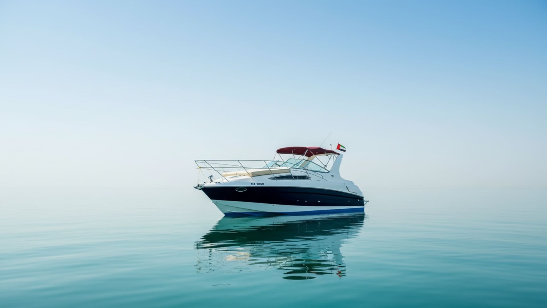 Sleek exterior of Moonlight Star 33 ft yacht on water